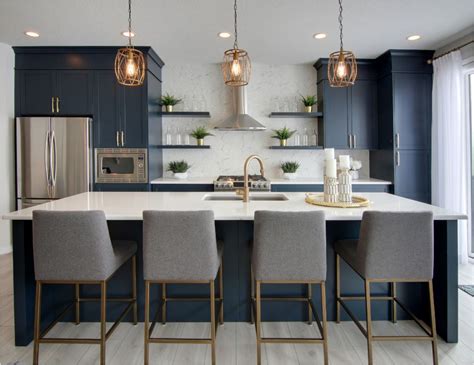 blue kitchen cabinets with stainless steel countertops|blue lower cabinets gray upper.